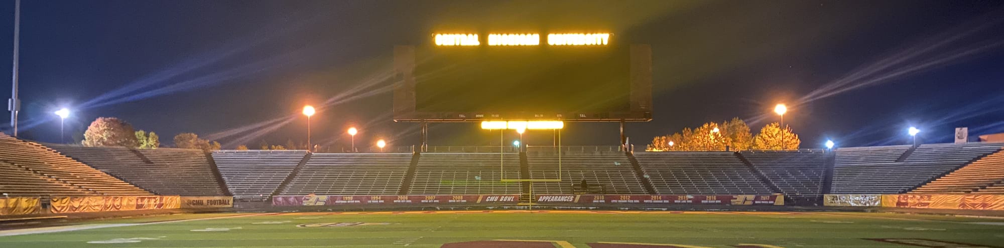 empty football stadium at night under the lights Waco