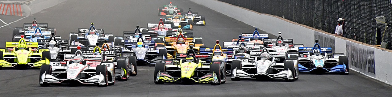 indy cars racing to through the start line Waco